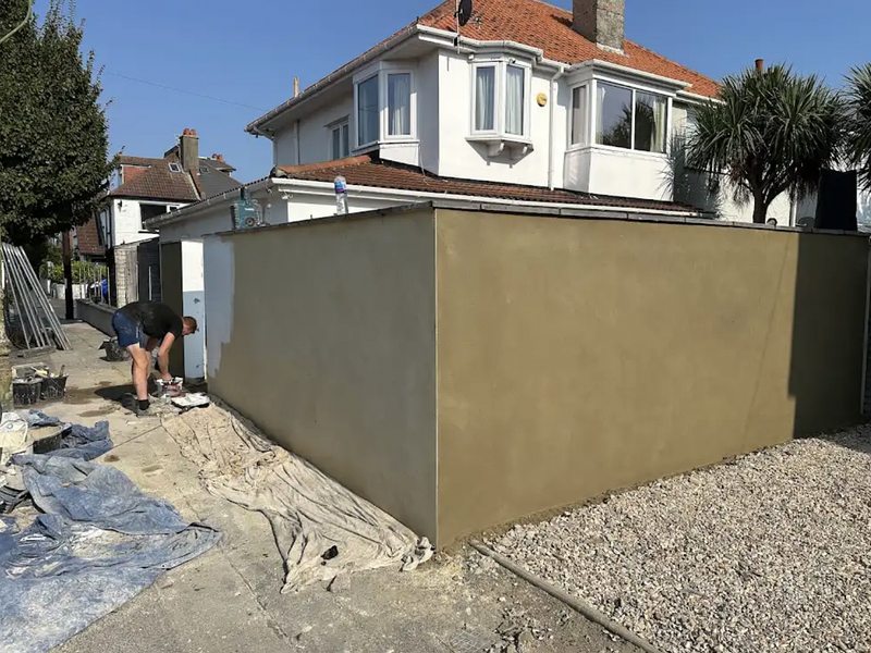 Rendering a garden wall in Poole — MNM Building Services